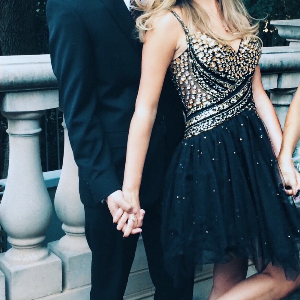 Sherri Hill Black and Gold Rhinestone Homecoming Dress.